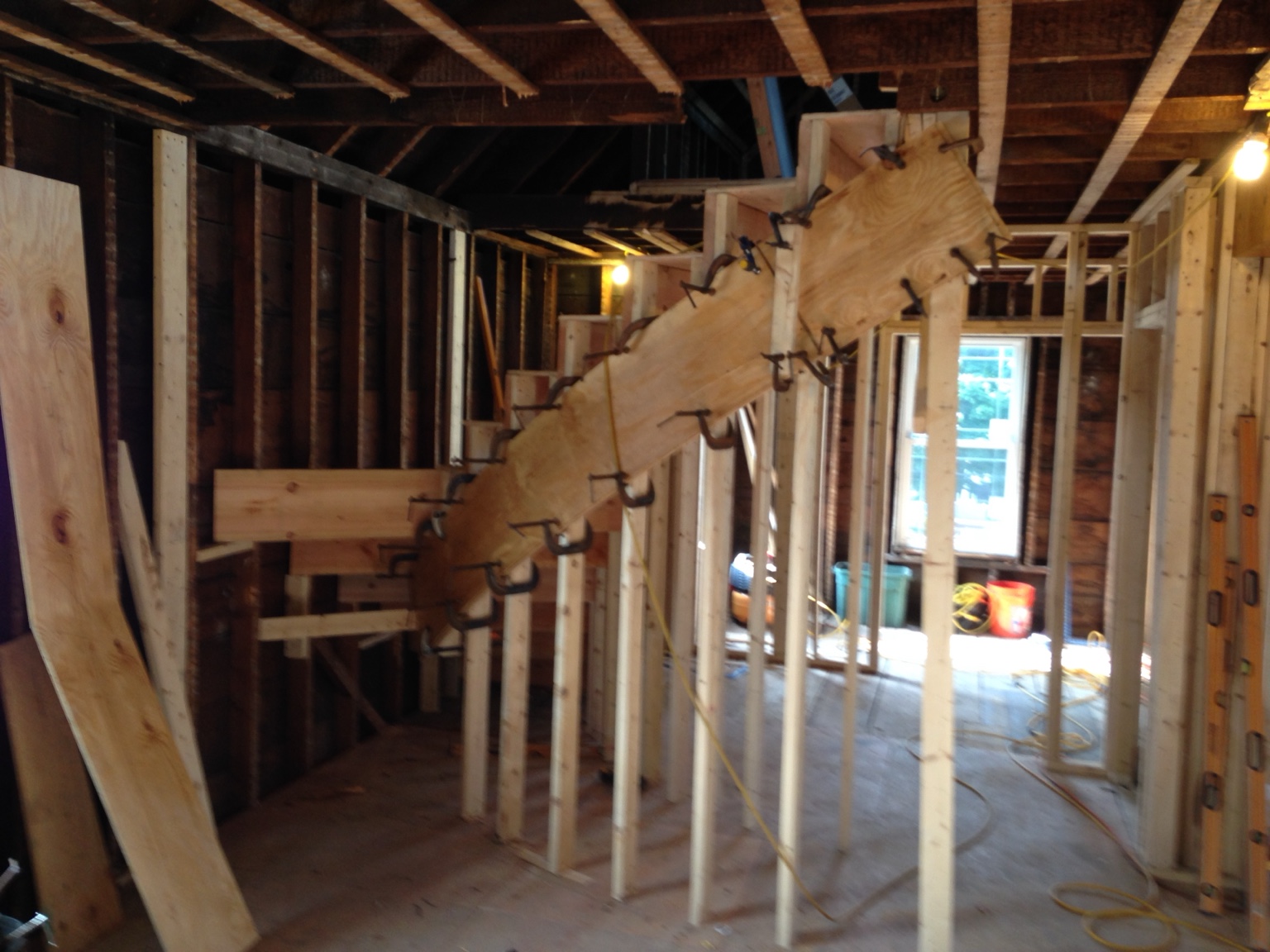 Custom curved staircase during construction